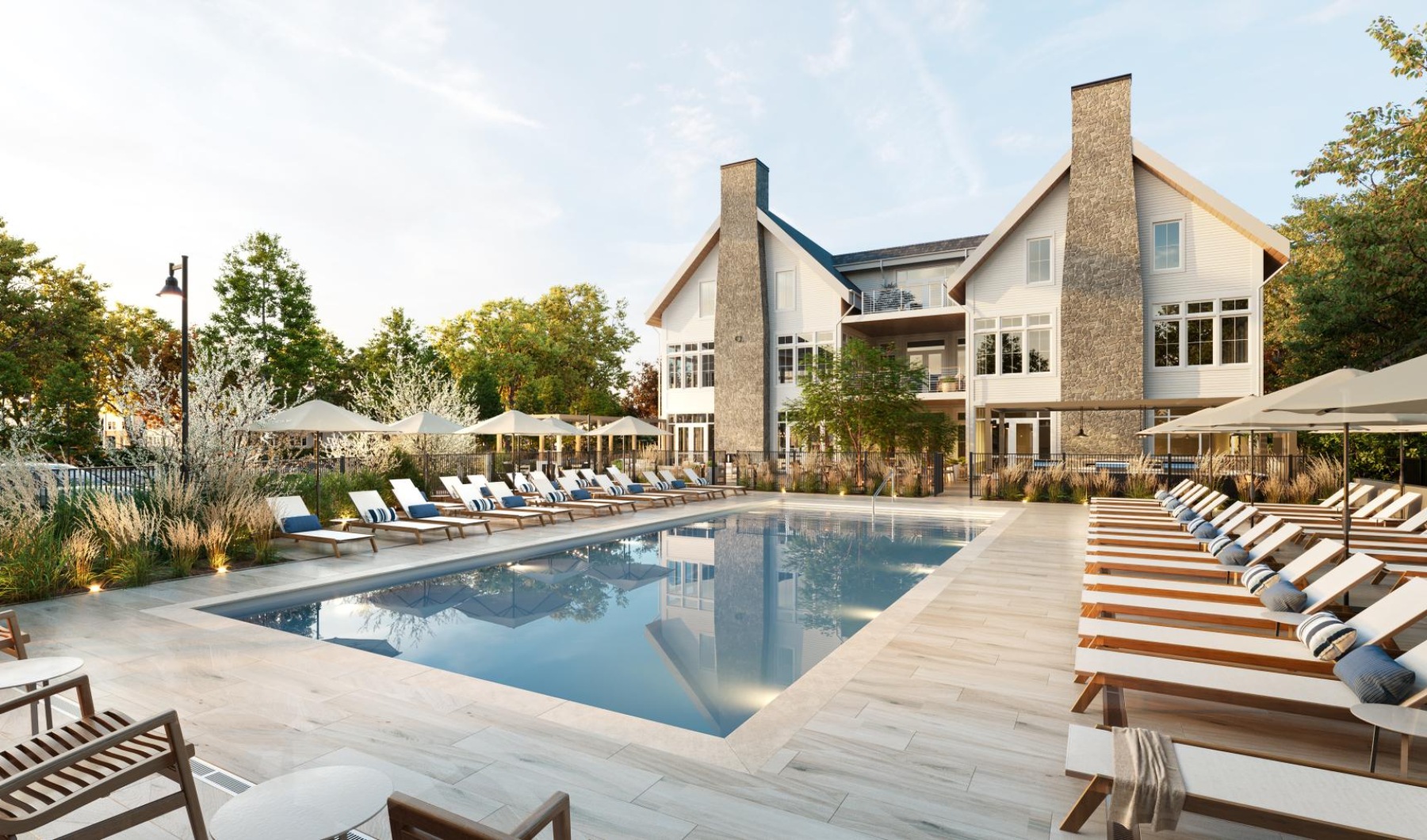 a swimming pool with chairs around it